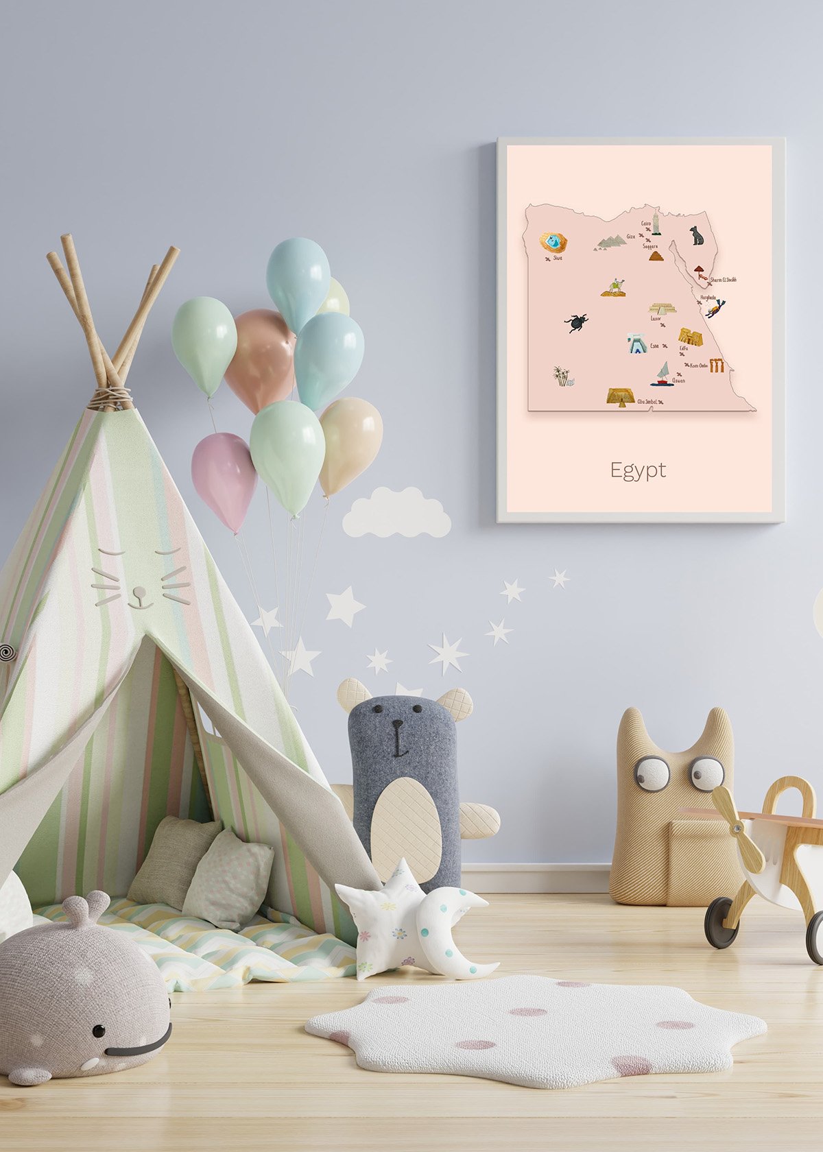 A children's bedroom is pictured with neutral tinted colors. A canvas tipi is filled with stuffed animals in white tones. The wall is grey. On the wall there's a white poster frame filled with a brown toned illustrated poster map of Egypt.